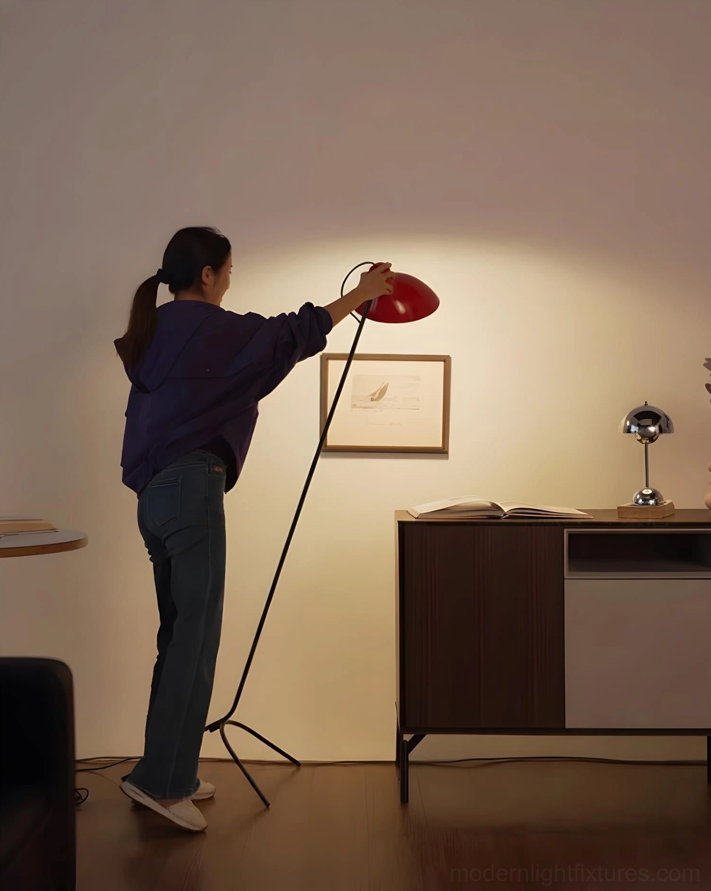 Modern arc tripod floor lamp showcase from side angle, minimalist curved pole design with dome shade profile