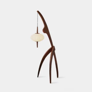 Modern arc floor lamp with dark walnut wooden frame and off-white fabric lantern shade against white studio backdrop
