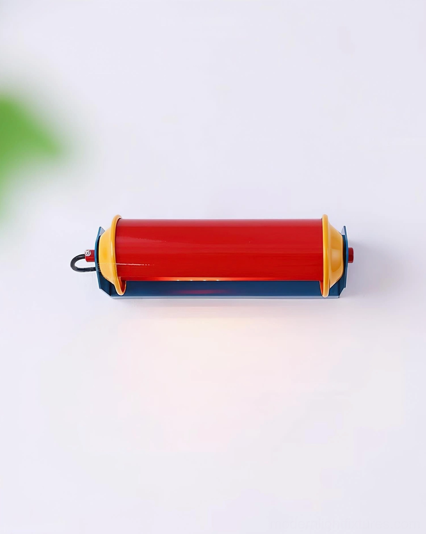 Modern cylindrical wall sconce direct front view with compact tri-color body and power port detail on neutral background