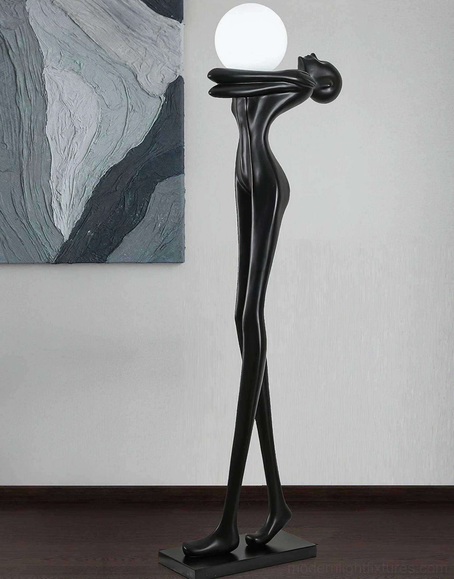 Abstract human figure floor lamp in modern home setting, right side view on dark wood flooring, artistic statement lighting