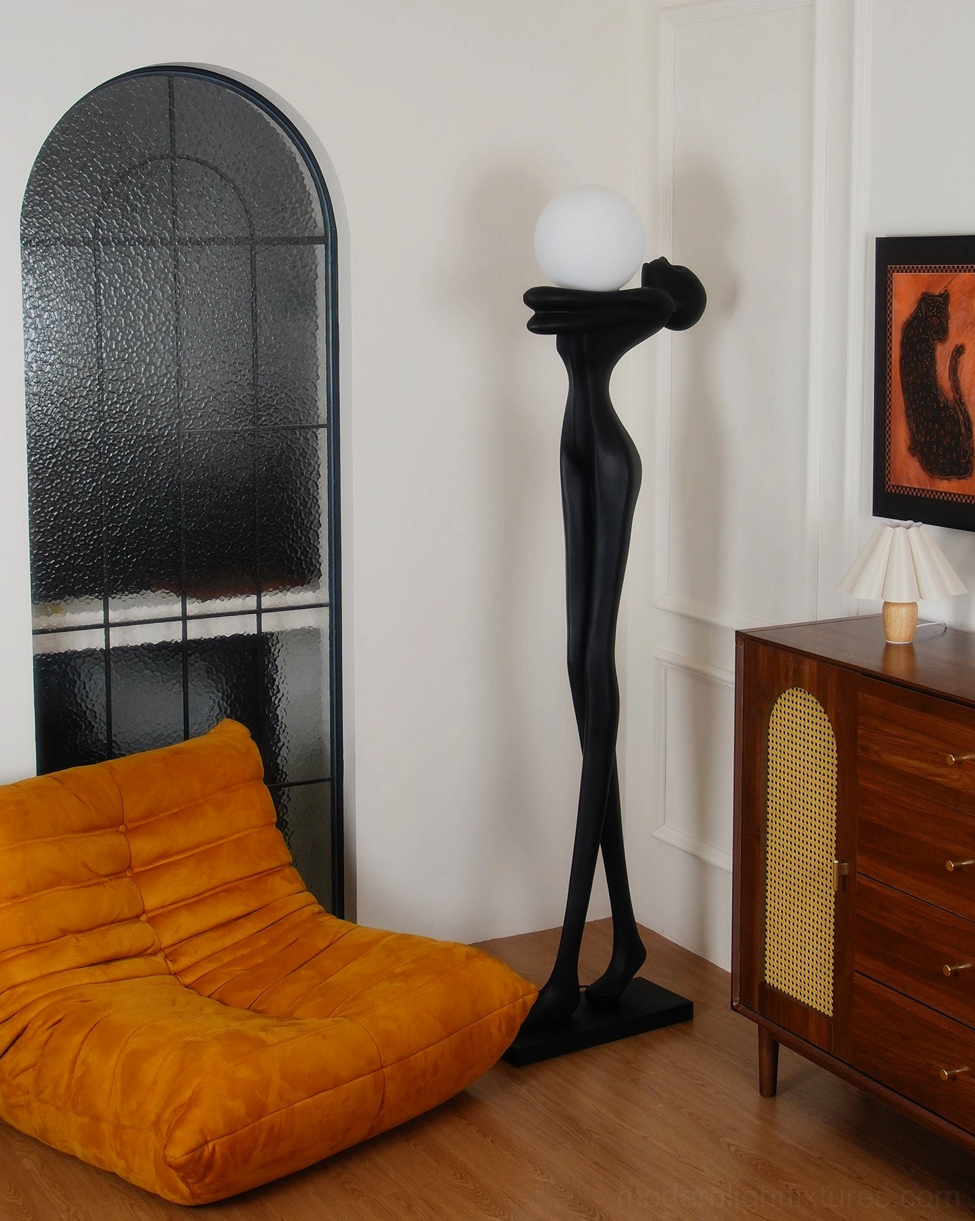 Modern art floor lamp sculpture design, black matte resin construction, contemporary home fixture