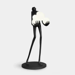 Modern artistic humanoid floor lamp with matte black resin body and frosted white glass globe shades against white studio background