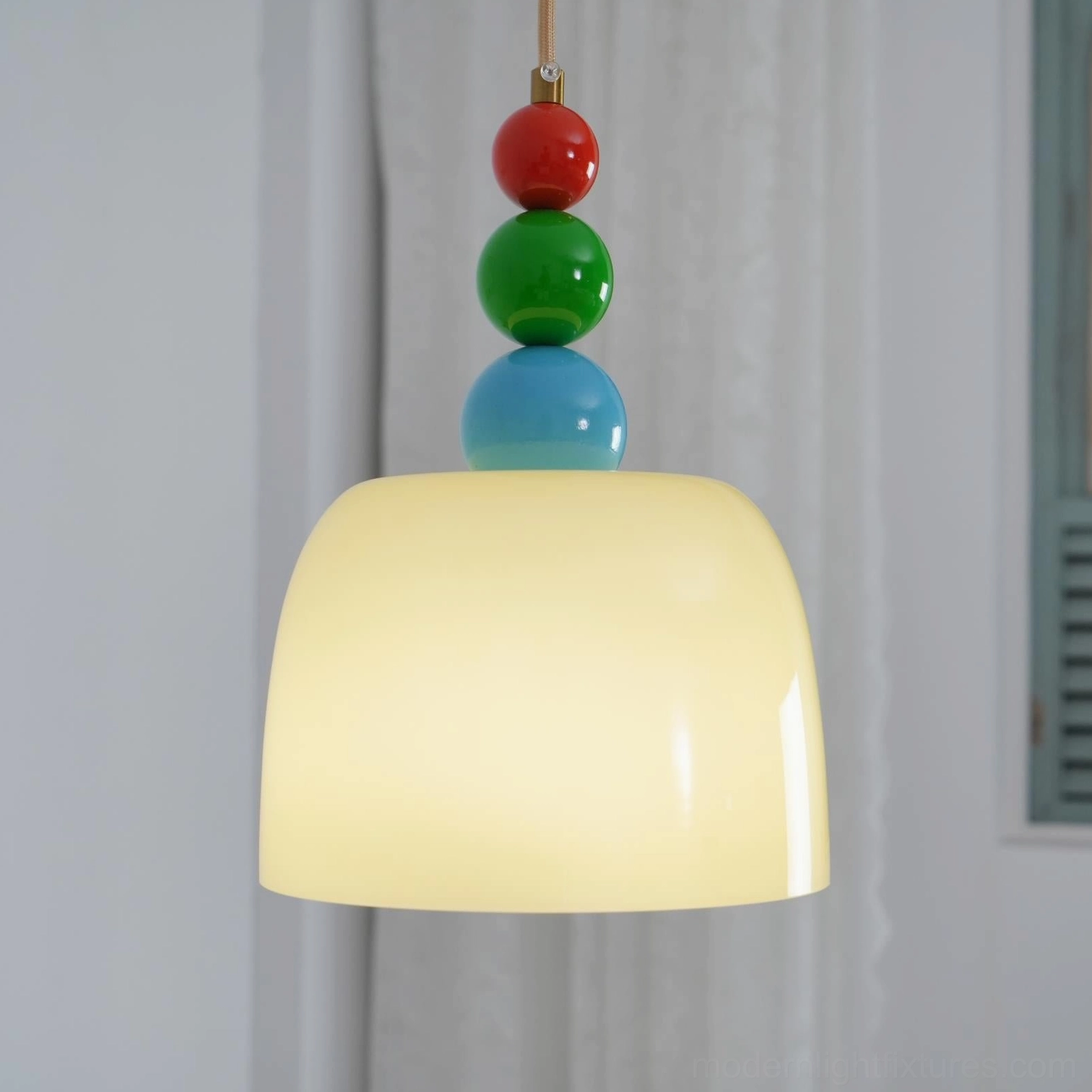 Modern beaded pendant light fixture showcasing vibrant colors and artistic arrangement