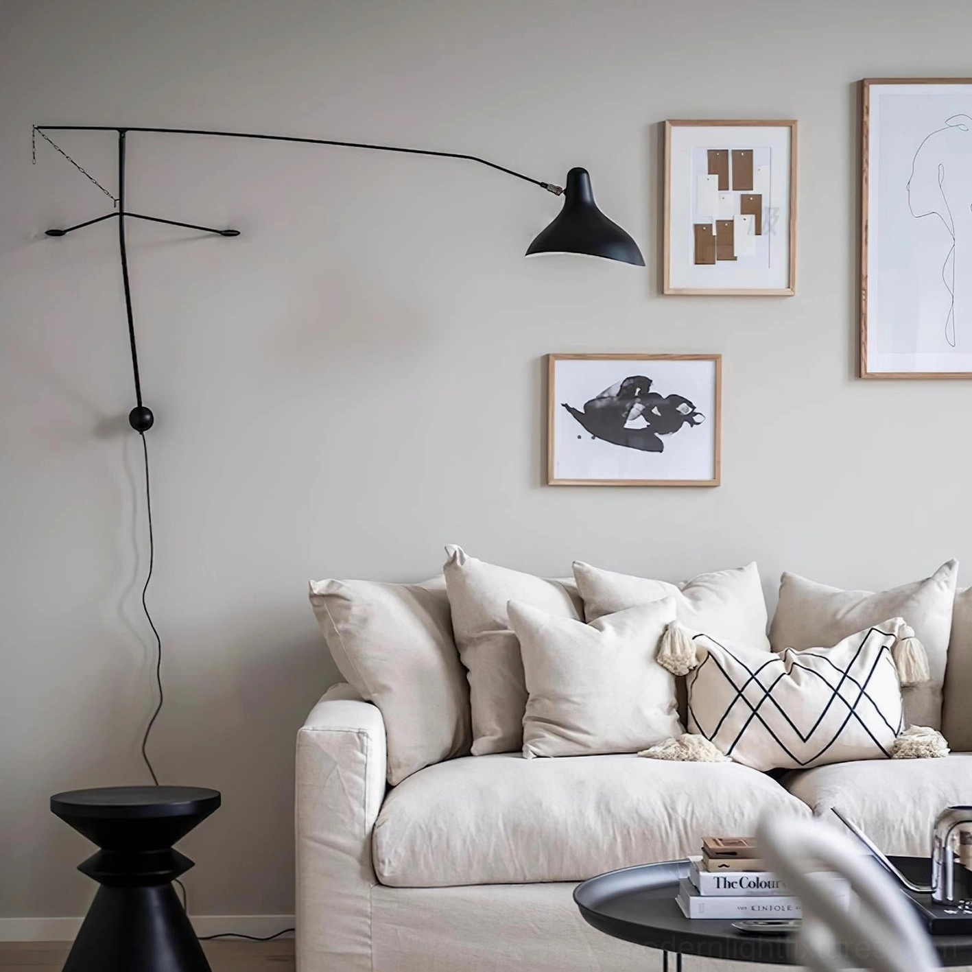 Modern black articulating wall sconce geometric form study