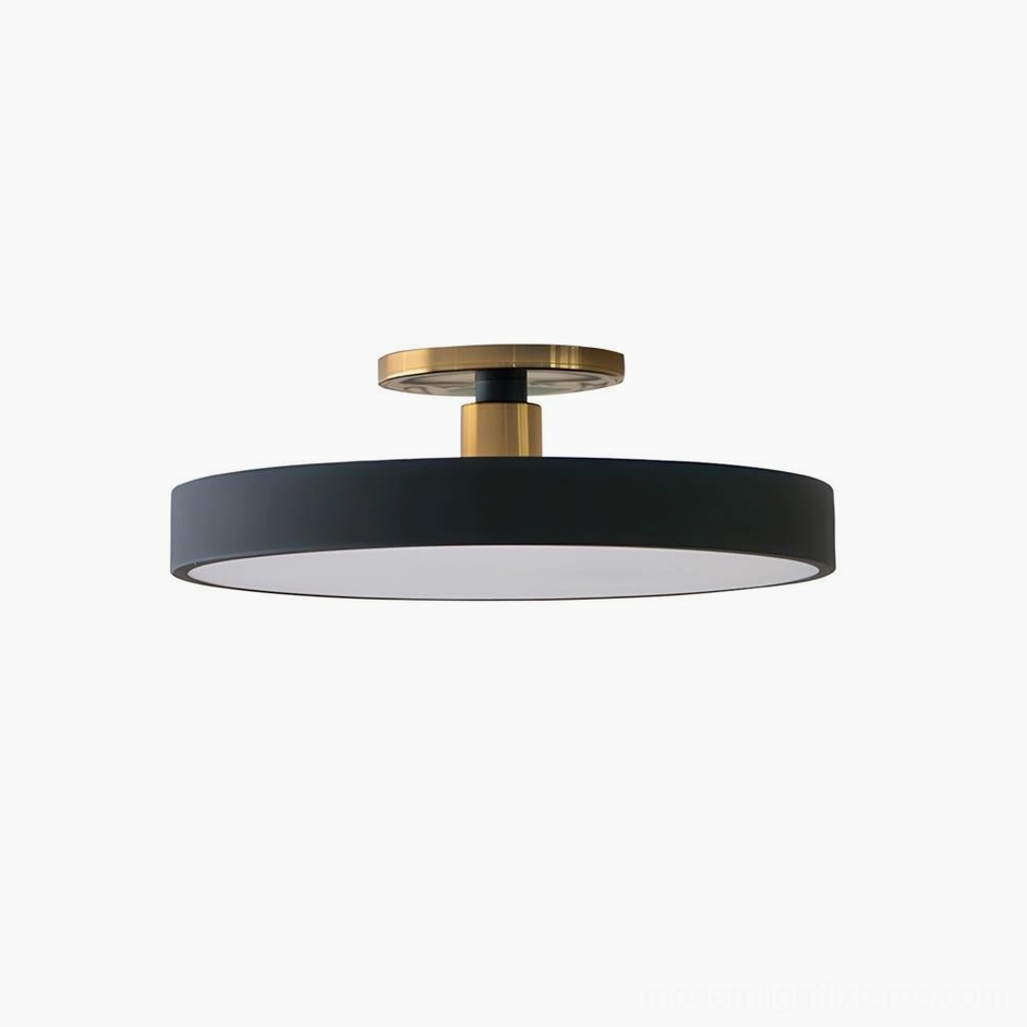 Modern round flush mount ceiling light in matte black with brass gold mounting hardware