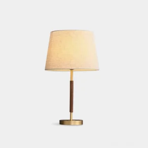 Brass and walnut mid-century modern table lamp with tapered linen shade, front flat studio perspective