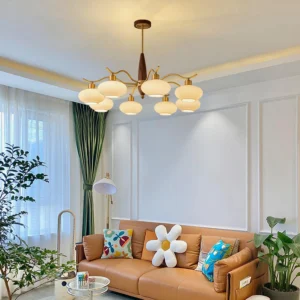 Brass walnut glass chandelier installed in contemporary living room with warm ambient lighting and modern interior décor