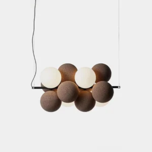 Modern bubble cluster pendant light with matte mixed brown and off-white spherical shades in minimalist Nordic design style