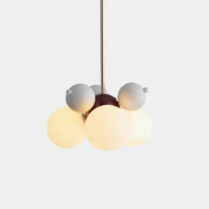 Modern bubble pendant light with white and cream spherical glass shades on minimalist white background - contemporary hanging fixture front view