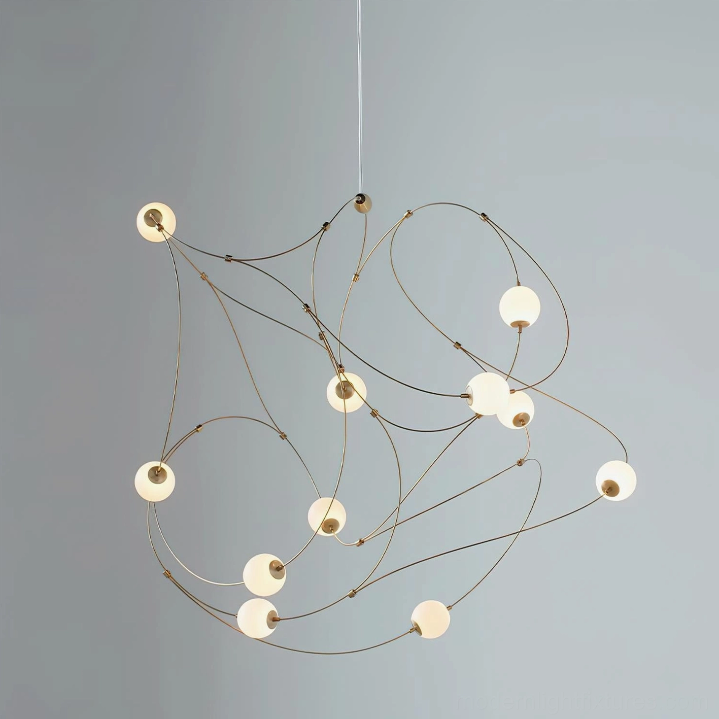 Modern butterfly pendant chandelier with multiple acrylic sphere elements creating sculptural lighting installation for contemporary interiors
