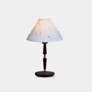 Modern butterfly perforated table lamp with hollow fabric shade on white background studio photography