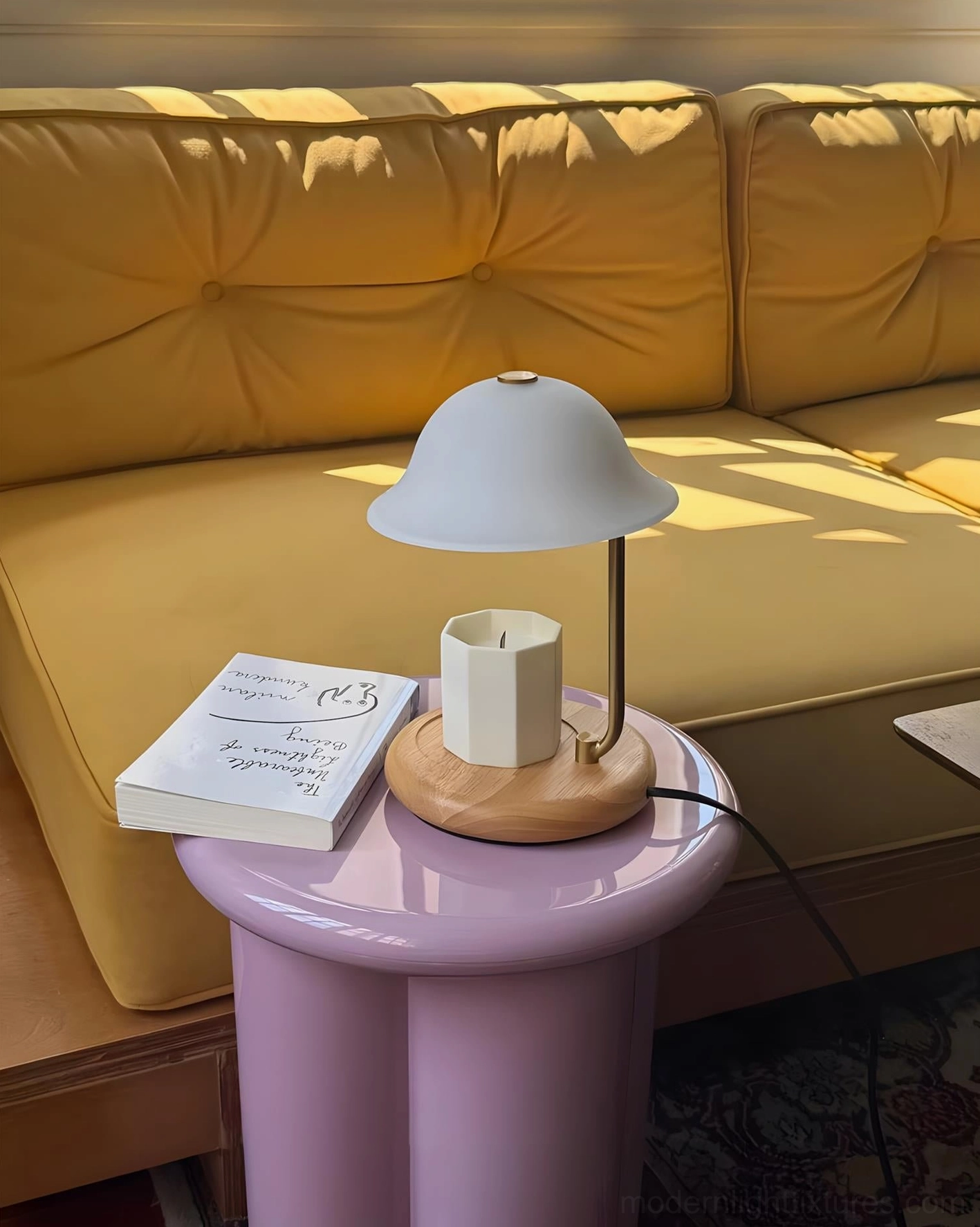Mid-century modern candle warmer lamp with mushroom-shaped white shade on pastel styled surface