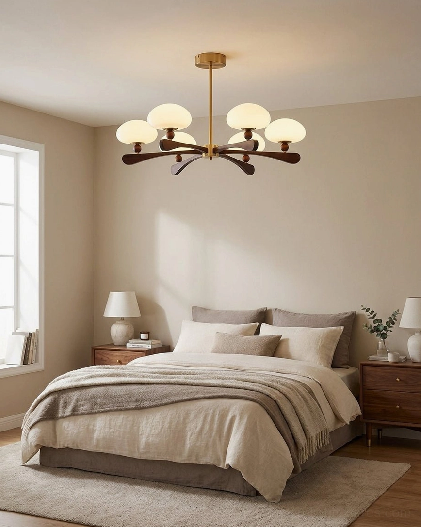 6-light modern multi-arm chandelier installed in neutral minimalist bedroom with warm ambient lighting from opal glass shades
