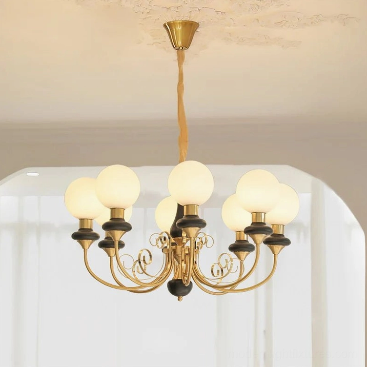 Modern chandelier with gold and sage green ceramic accents, sophisticated palette