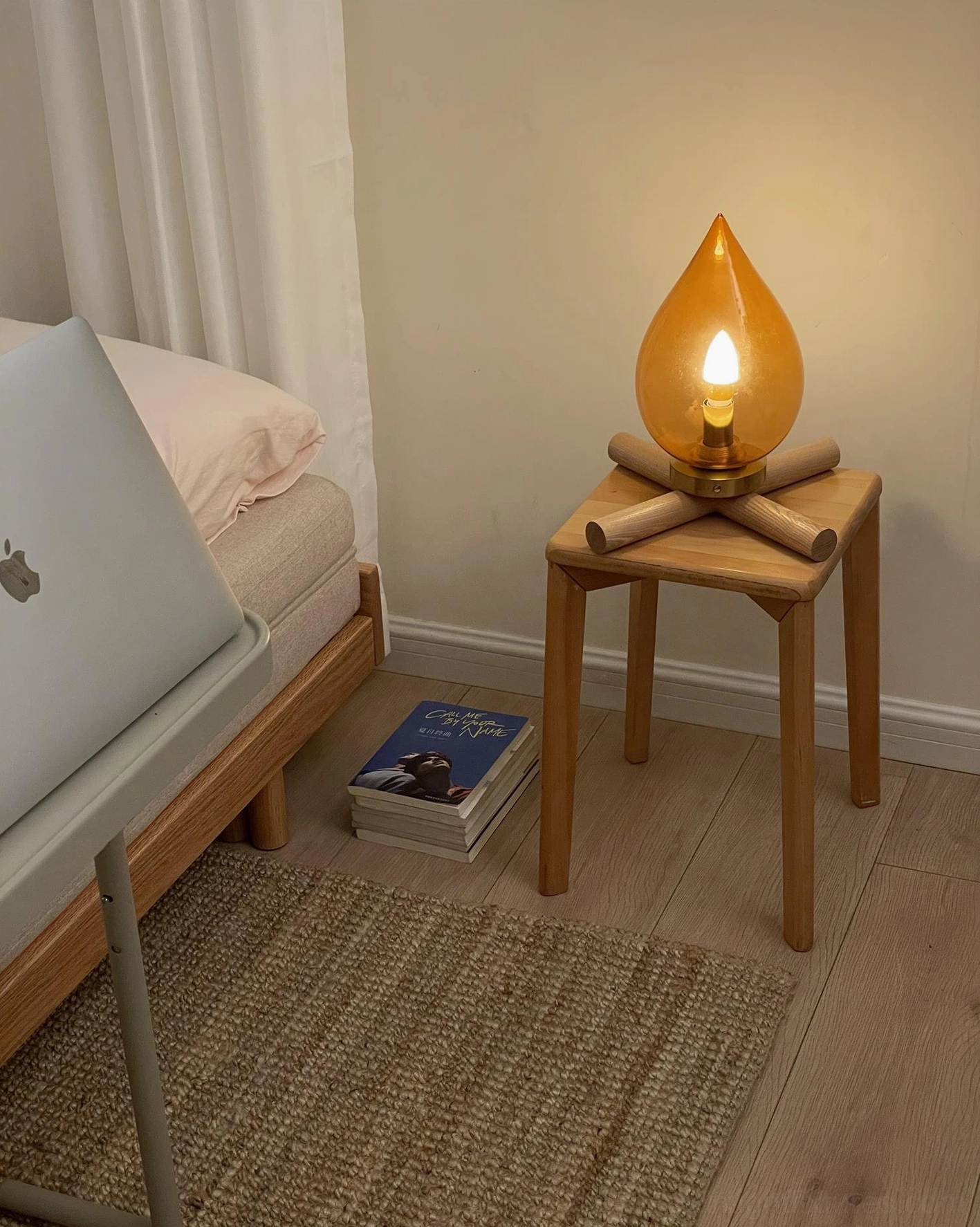 Modern cordless table lamp in rustic wood finish, sculptural base design detail