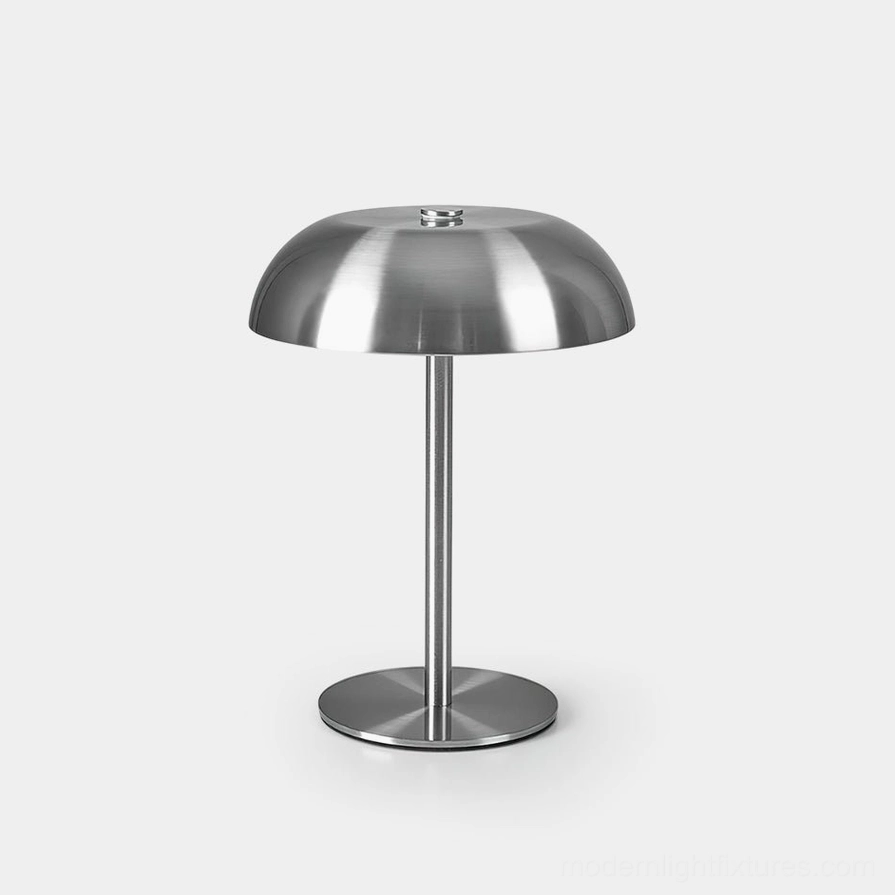 Modern Crescent LED table lamp with brushed silver metal dome shade and minimalist design, front studio view