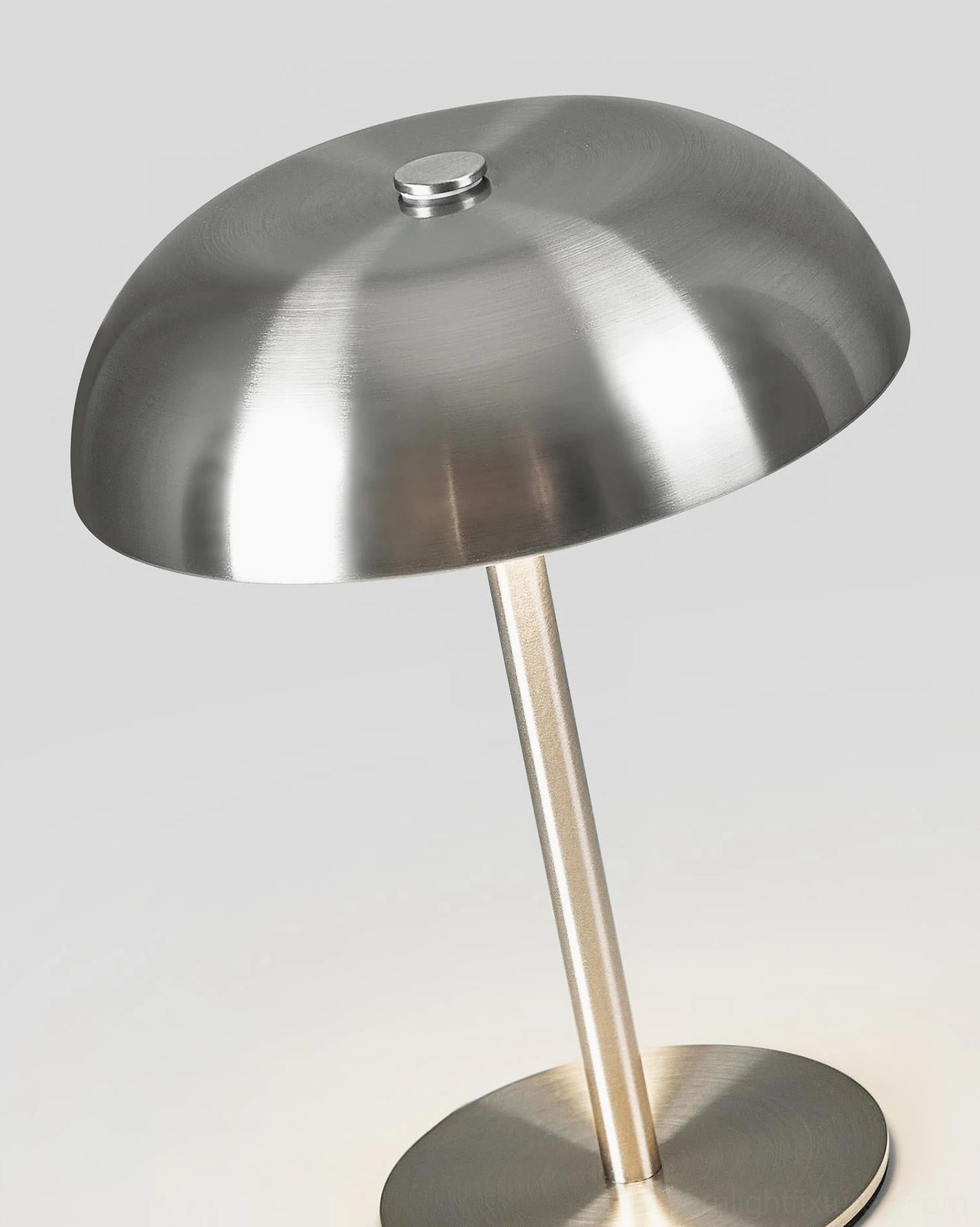 Crescent modern table lamp with integrated LED and USB charging port, studio perspective