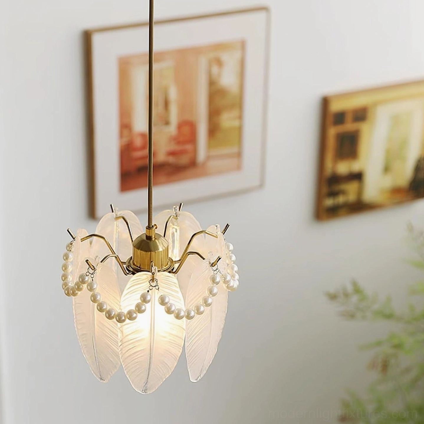 Modern crystal petal pendant lamp installation in contemporary home entryway creating elegant light fixture ambiance