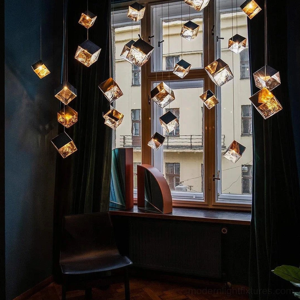 Contemporary cube pendant light fixture installed in vintage home interior with warm illumination
