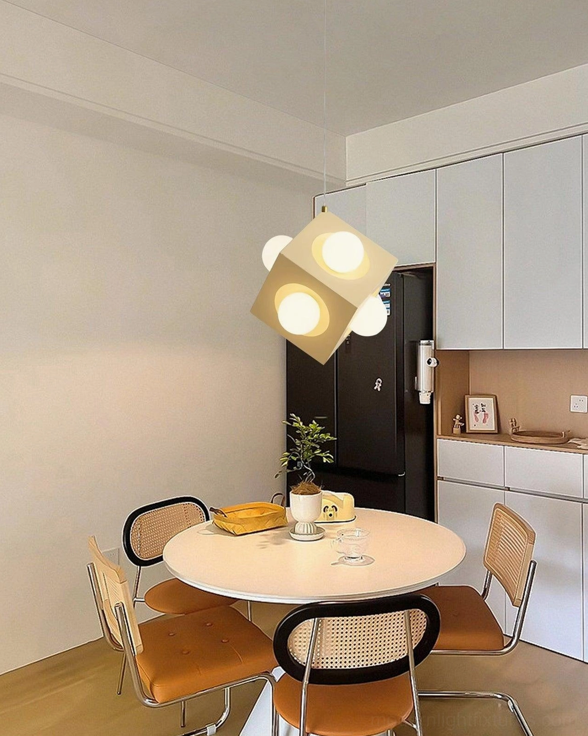 Modern yellow cubic pendant light fixture showcasing geometric minimalist design and construction