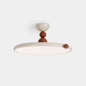 Modern minimalist disc ceiling light fixture with cream and brown two-tone design and polished orb accents, front three-quarter studio view