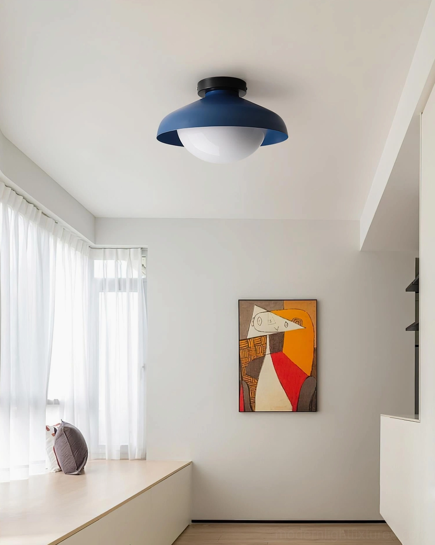 Contemporary semi-flush ceiling light with navy blue matte shade installed in modern bedroom with bay window, Nordic minimalist style