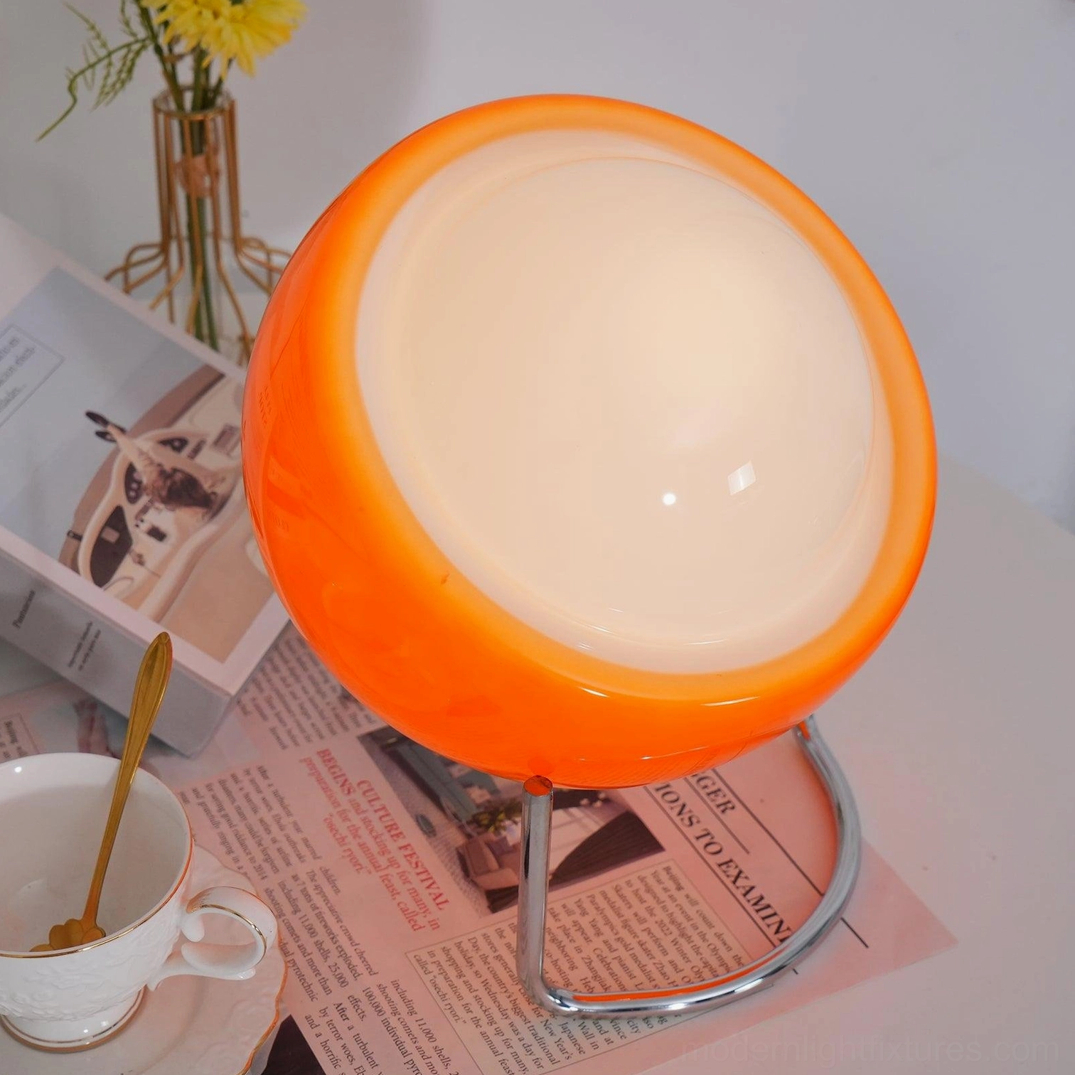 Modern dome table lamp detail showing E14 socket compatibility and chrome metal construction quality