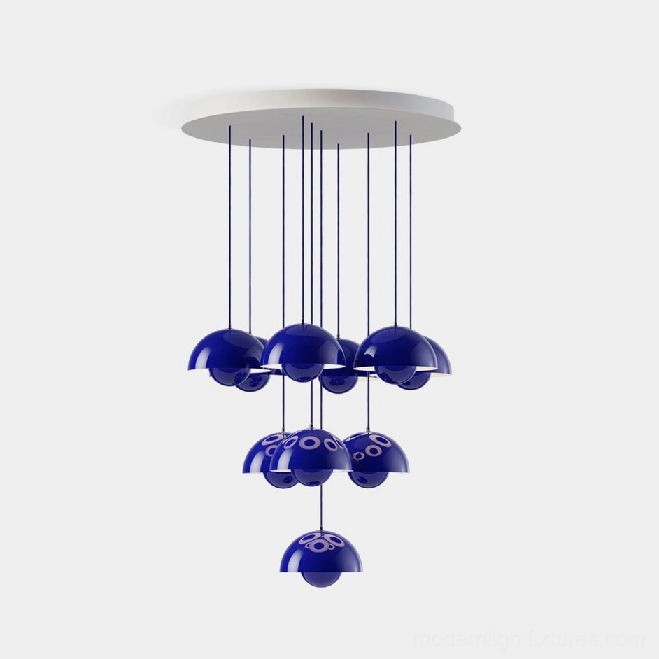 Modern multi-head dome pendant chandelier with dark blue matte finish, overhead view showing stacked hemispherical shades suspended at varying heights with white ceiling canopy