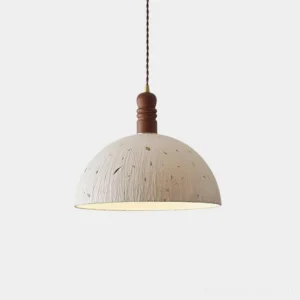 Handcrafted rice paper dome pendant light with organic leaf patterns and wooden top cap, frontal studio view