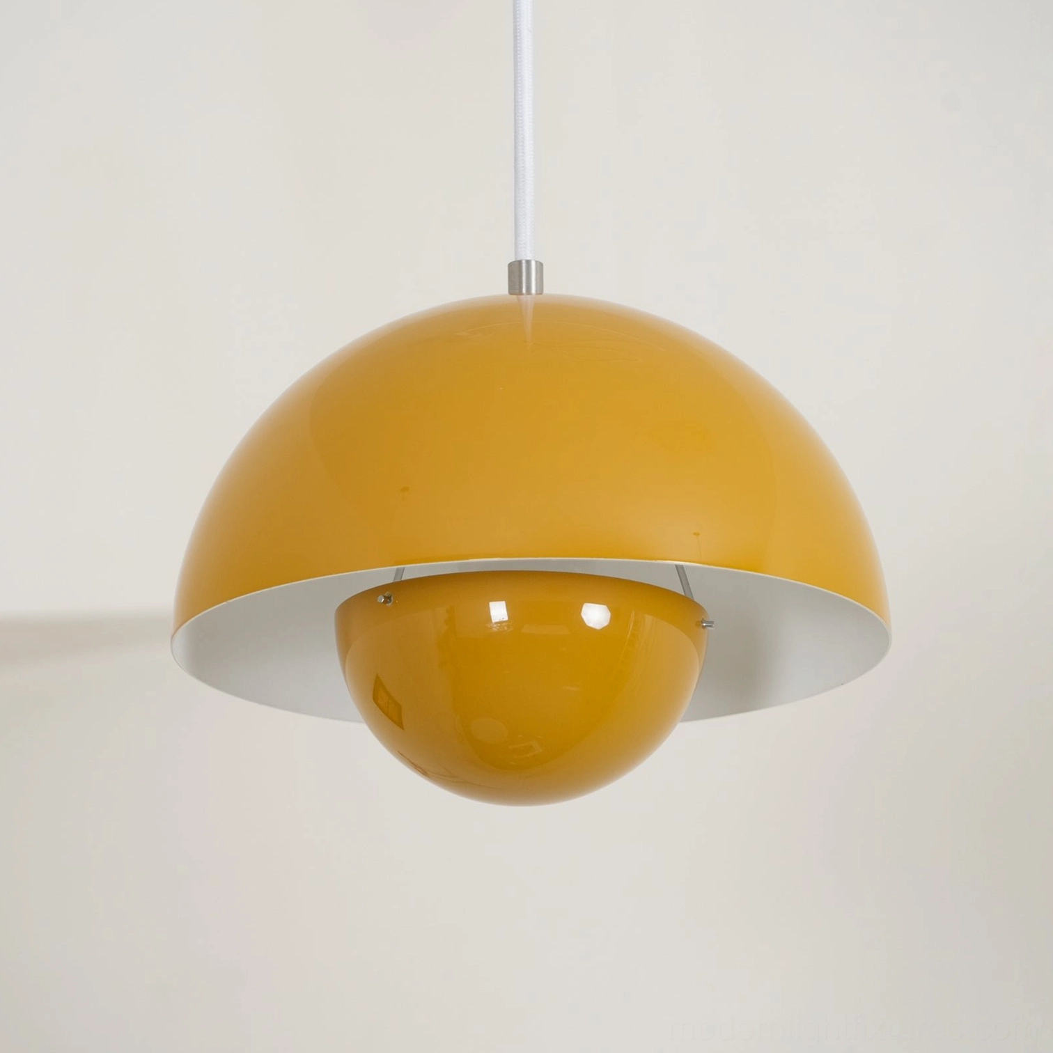 Modern two-tier dome pendant light with glossy yellow finish close-up studio view