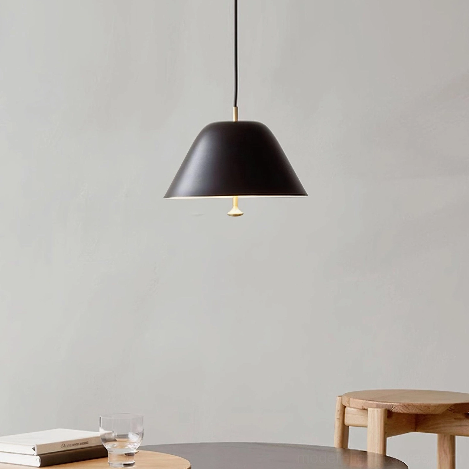 Modern dome pendant lighting creating ambient illumination in minimalist dining space