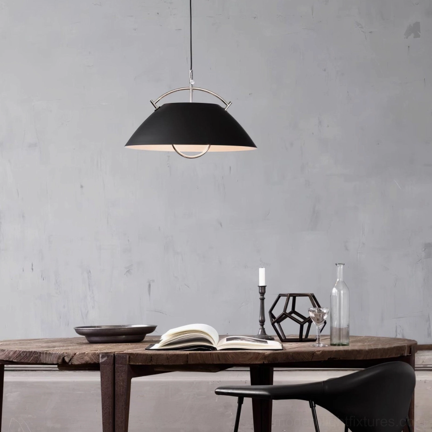 Overhead view of modern dome pendant light in rustic dining area with curved frame detail