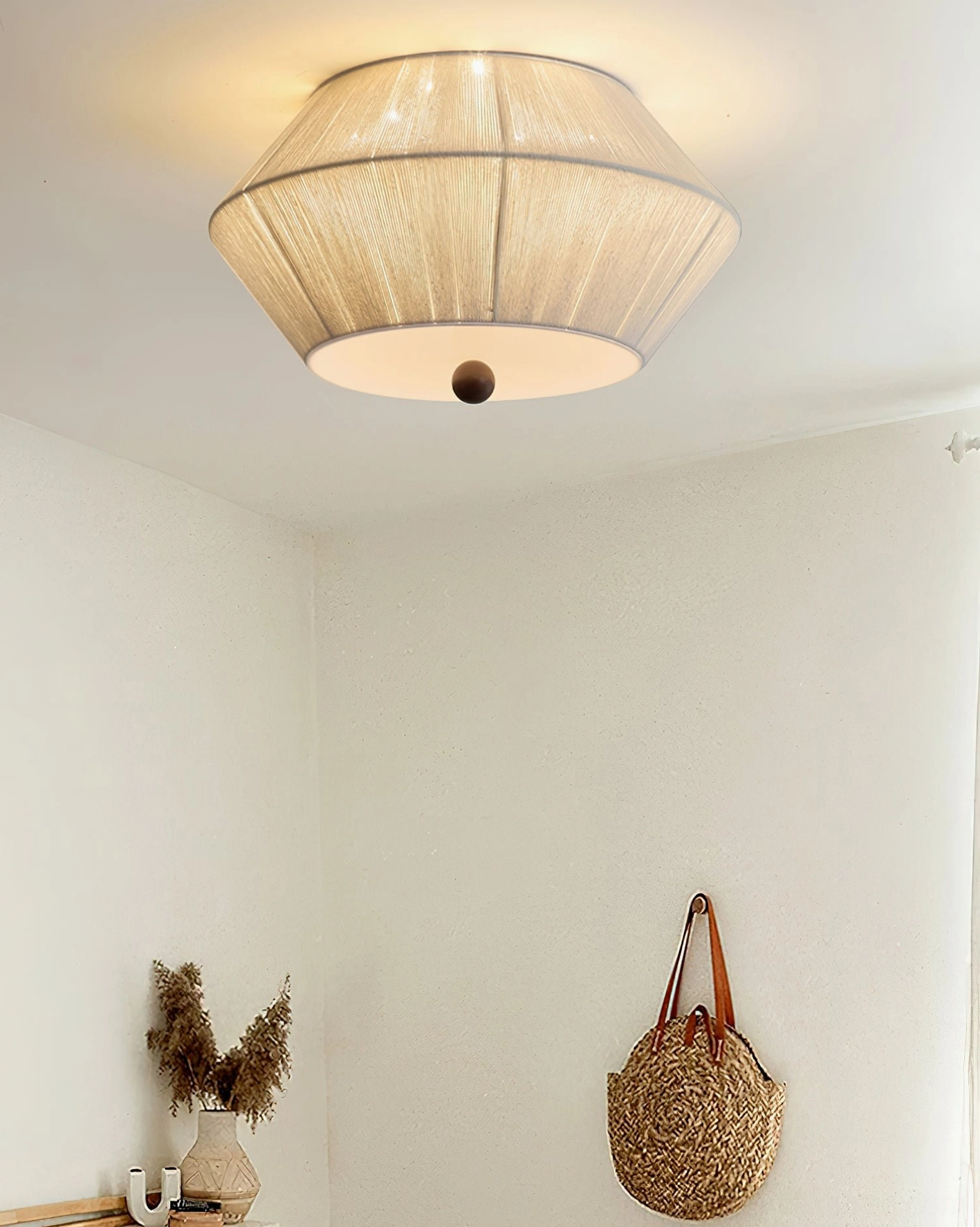 Modern tapered fabric flush mount ceiling light in natural light studio setting showing full product design