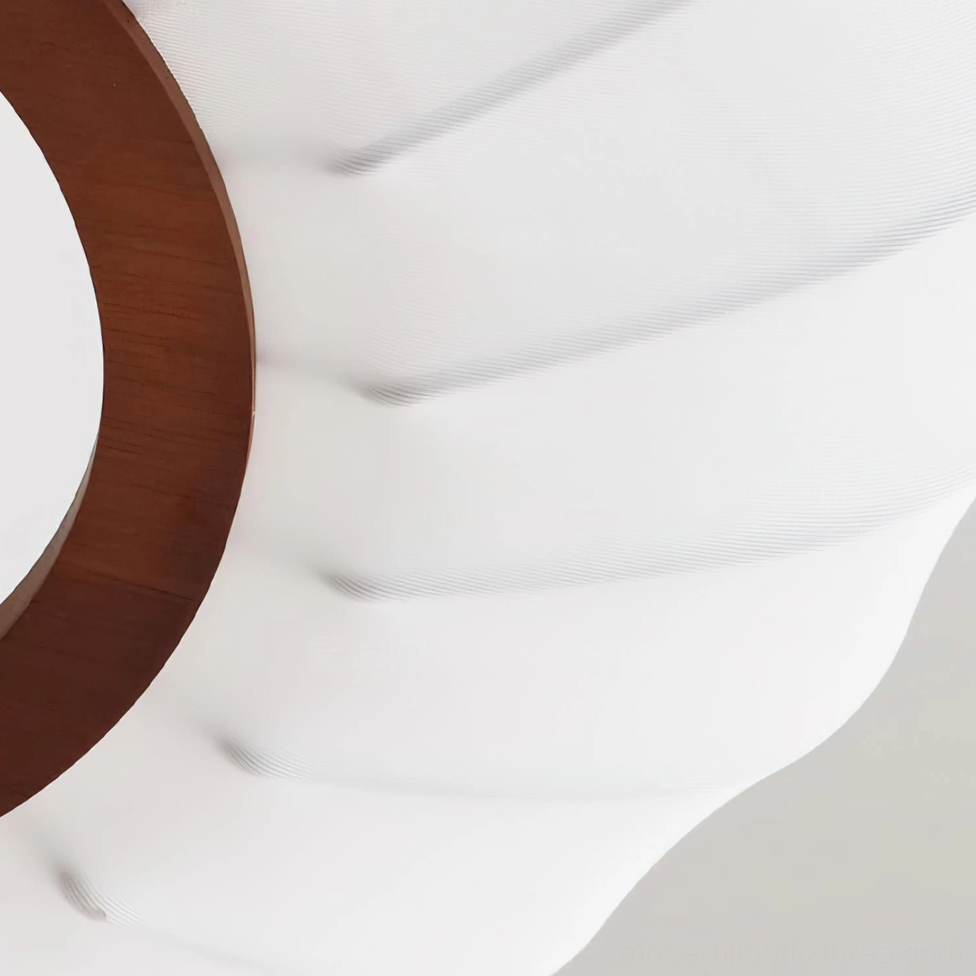 Contemporary fabric pendant lamp in minimalist space demonstrating versatile styling and soft ambient lighting