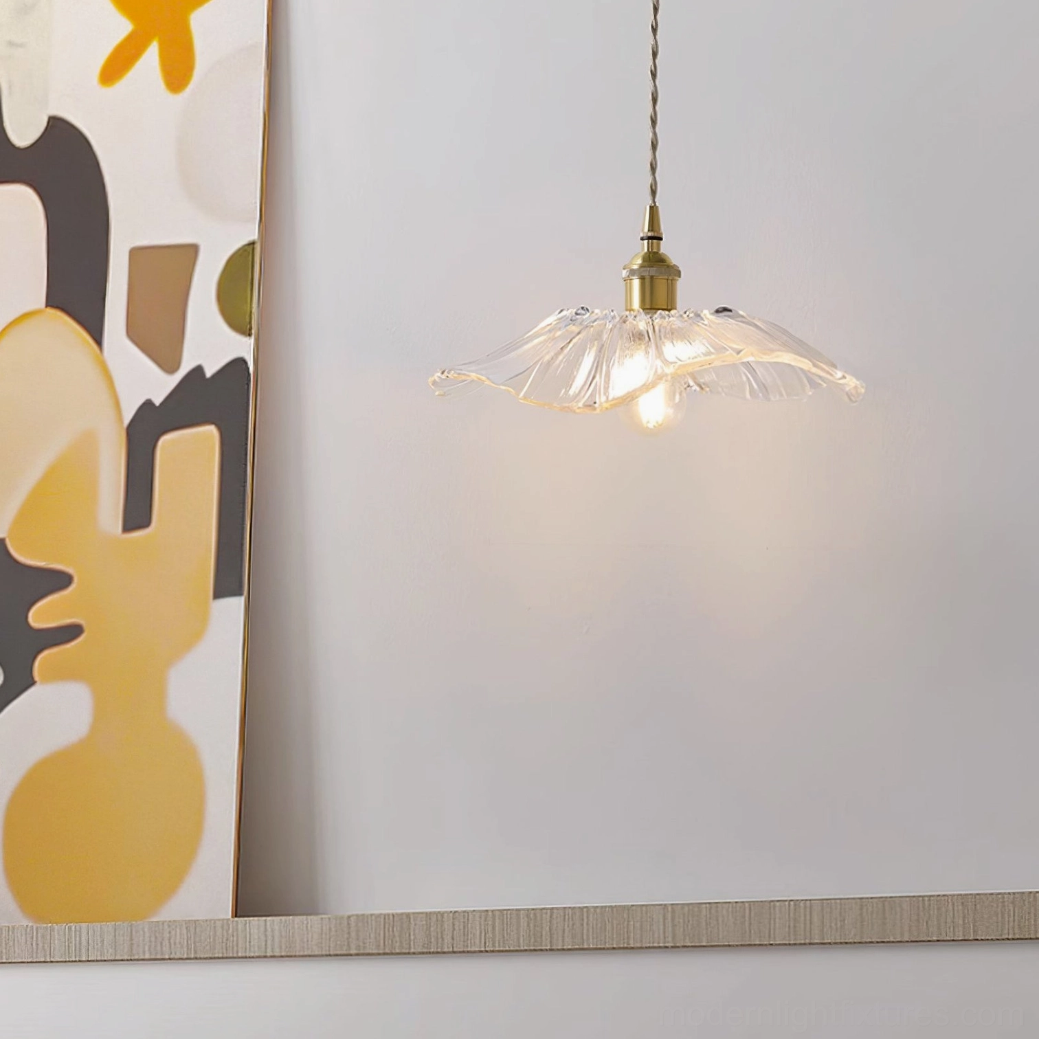 Modern flower glass pendant light with warm lighting in interior design setting