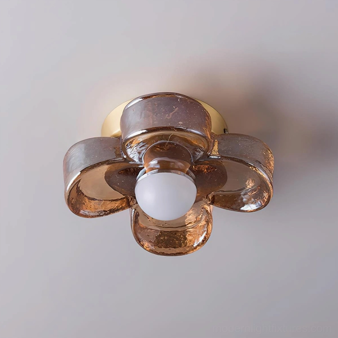 Modern four-leaf clover ceiling lamp with hand-blown amber glass and integrated LED warm white lighting
