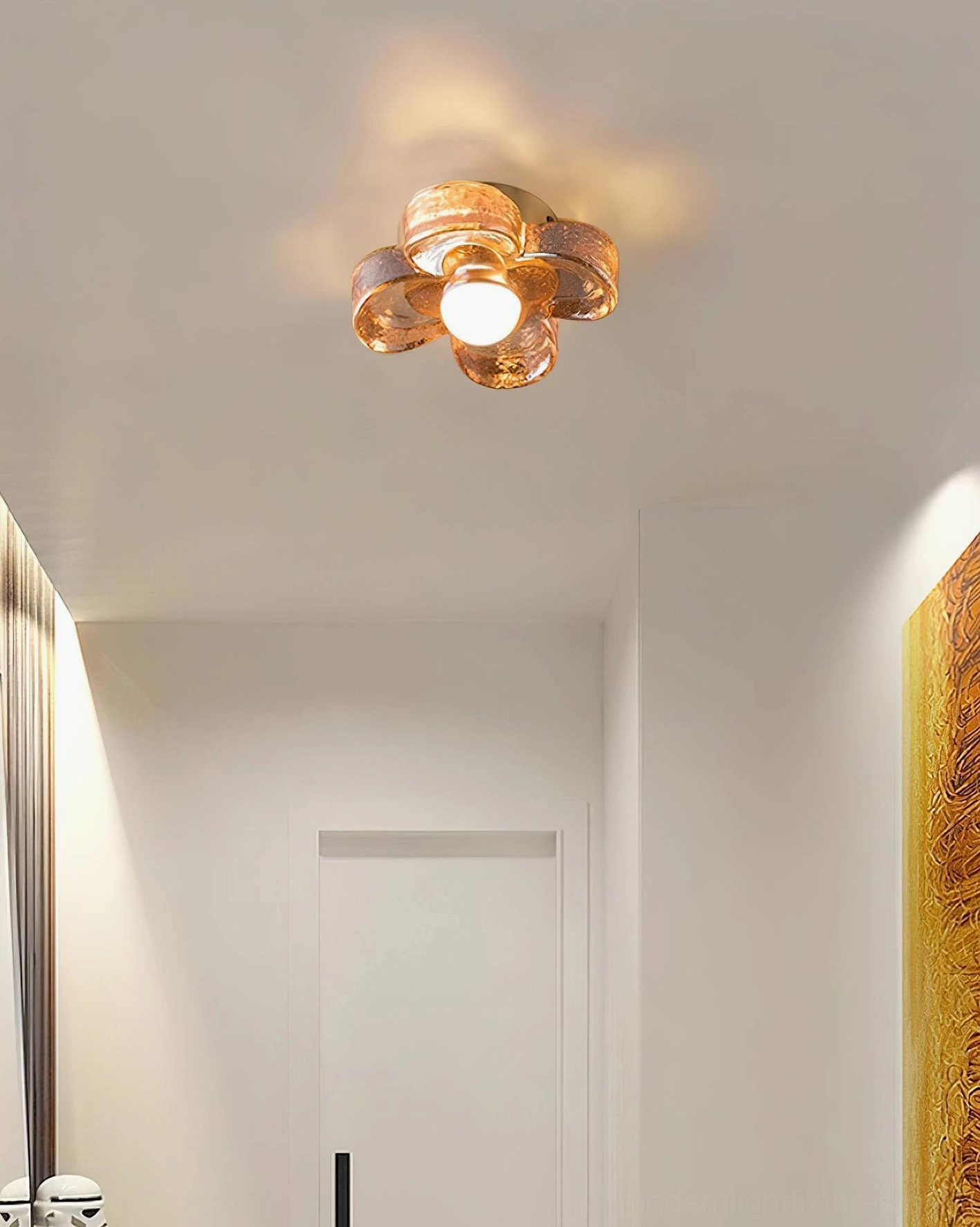 Single four-leaf clover flush mount ceiling fixture illuminated in minimalist hallway with neutral modern decor