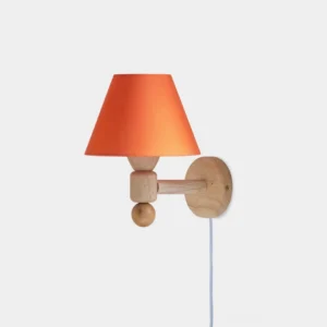 Modern minimalist wall sconce with orange conical shade and natural wood geometric arm mounted on white wall