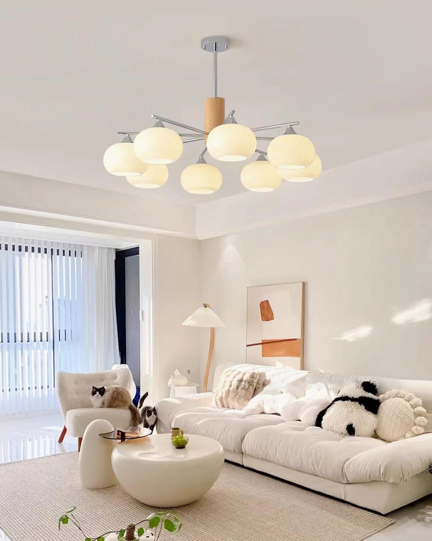 6-head scandinavian glass pendant with silver gold finish in cozy modern living room decor