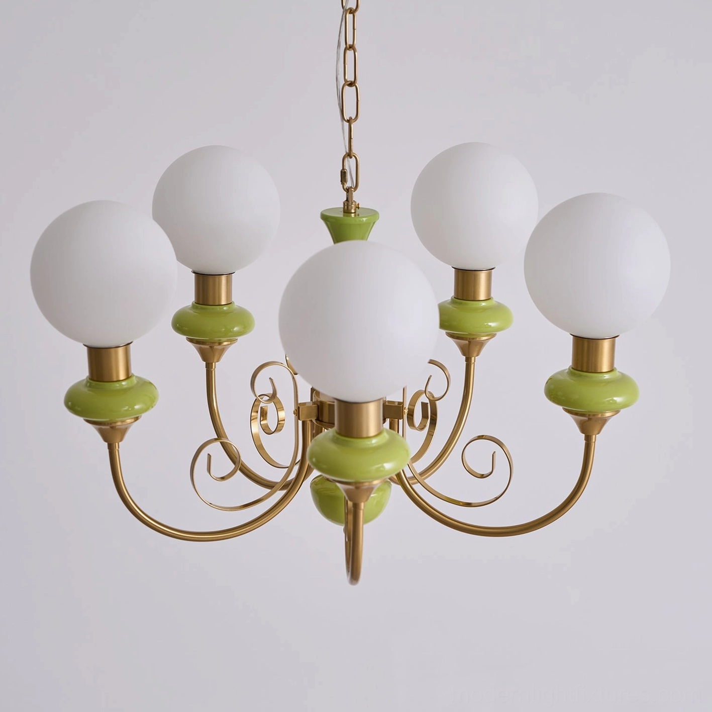 Modern glass chandelier with frosted spheres, elegant interior lighting solution