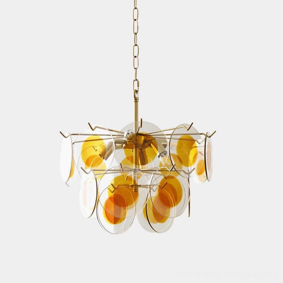 Modern glass disc chandelier with brass gold frame and caramel clear glass shades front view on white background