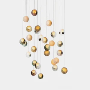 Hand-blown glass globe cluster chandelier with multiple clear glass orbs in modern minimalist style, studio photography
