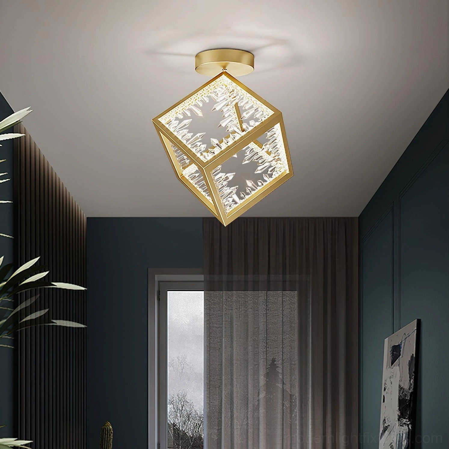 Modern gold ceiling light fixture installed in contemporary dark tone interior corner