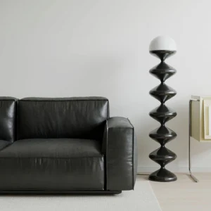 Contemporary gourd floor lamp side profile showcasing organic curved silhouette and matte black finish