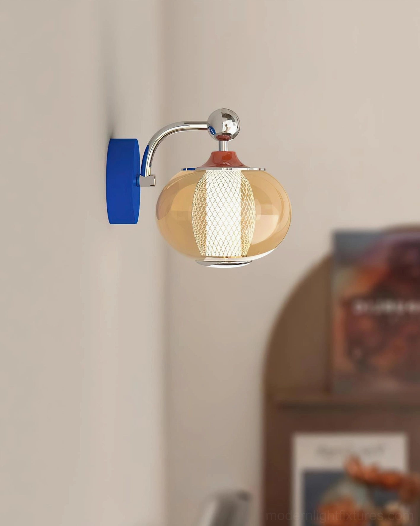 Modern Gyro sconce with blue metal base and adjustable swing arm on minimalist wall