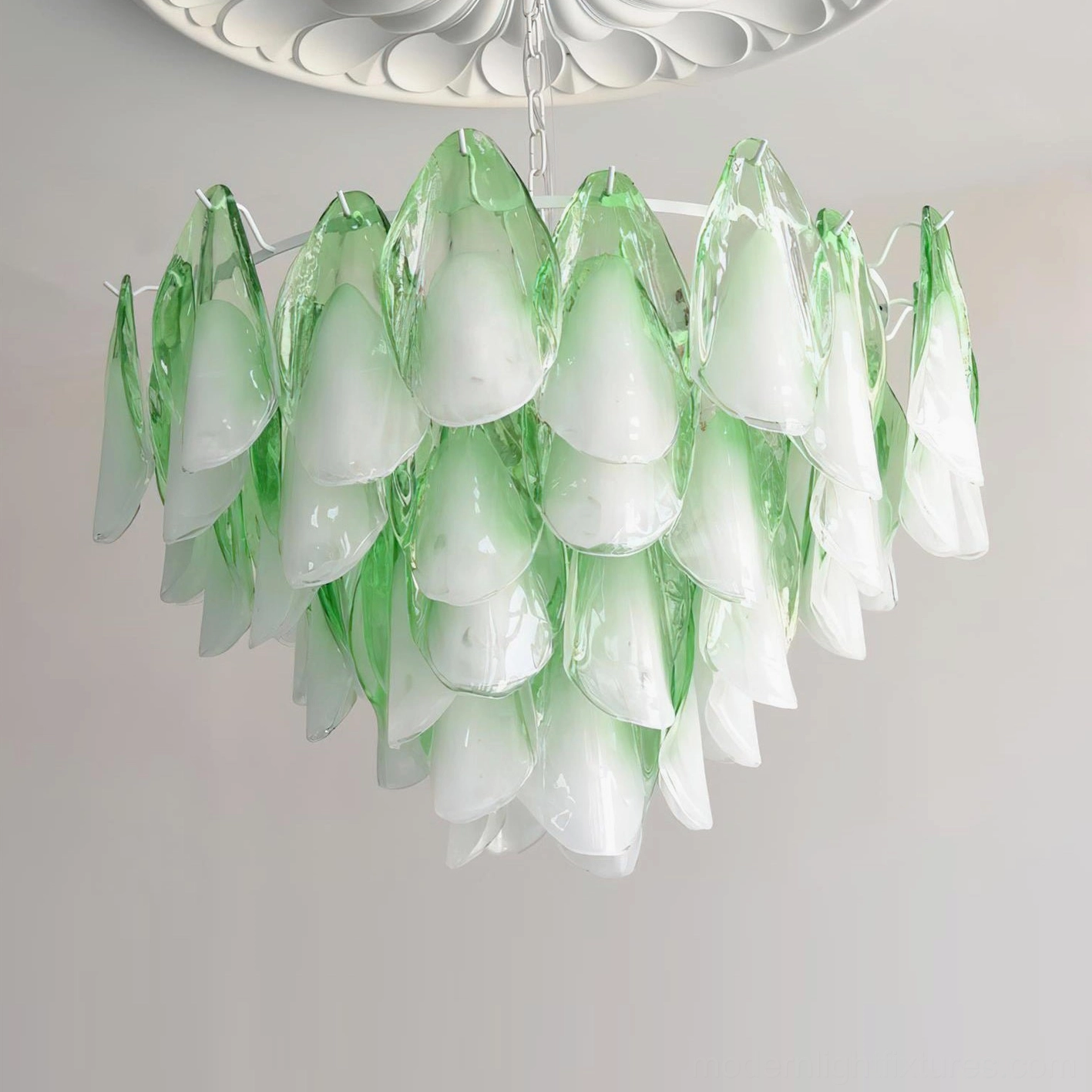 Modern handcrafted botanical chandelier showing glass petal arrangement and metal framework