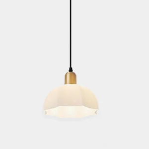 Horn scalloped pendant light with brass fixture and white frosted acrylic shade frontal view
