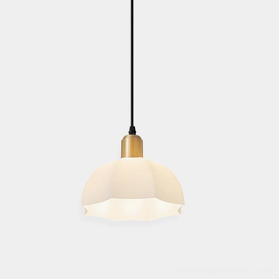 Horn scalloped pendant light with brass fixture and white frosted acrylic shade frontal view