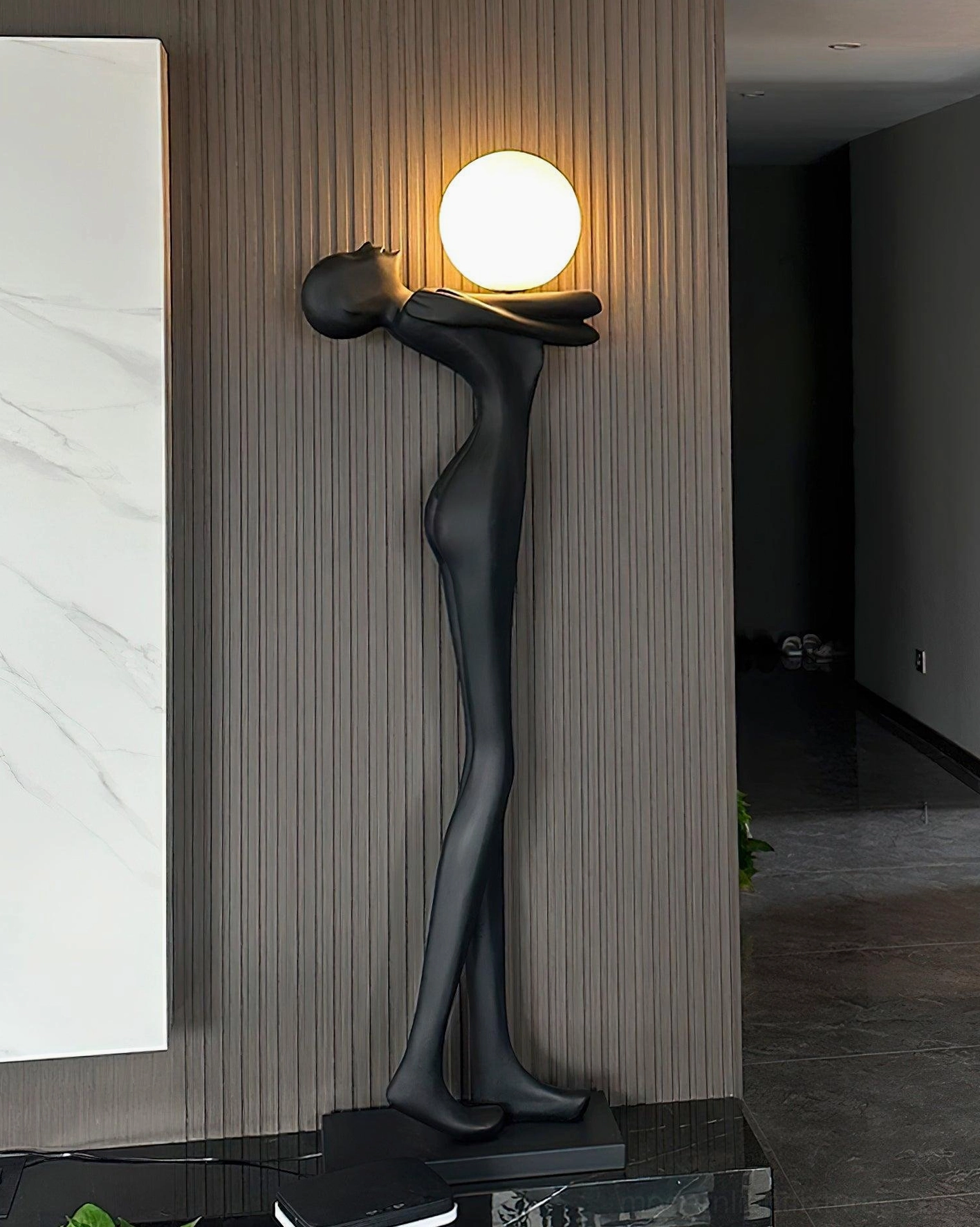 Modern human form floor lamp artistic design, frosted glass light diffusion, contemporary interior lighting