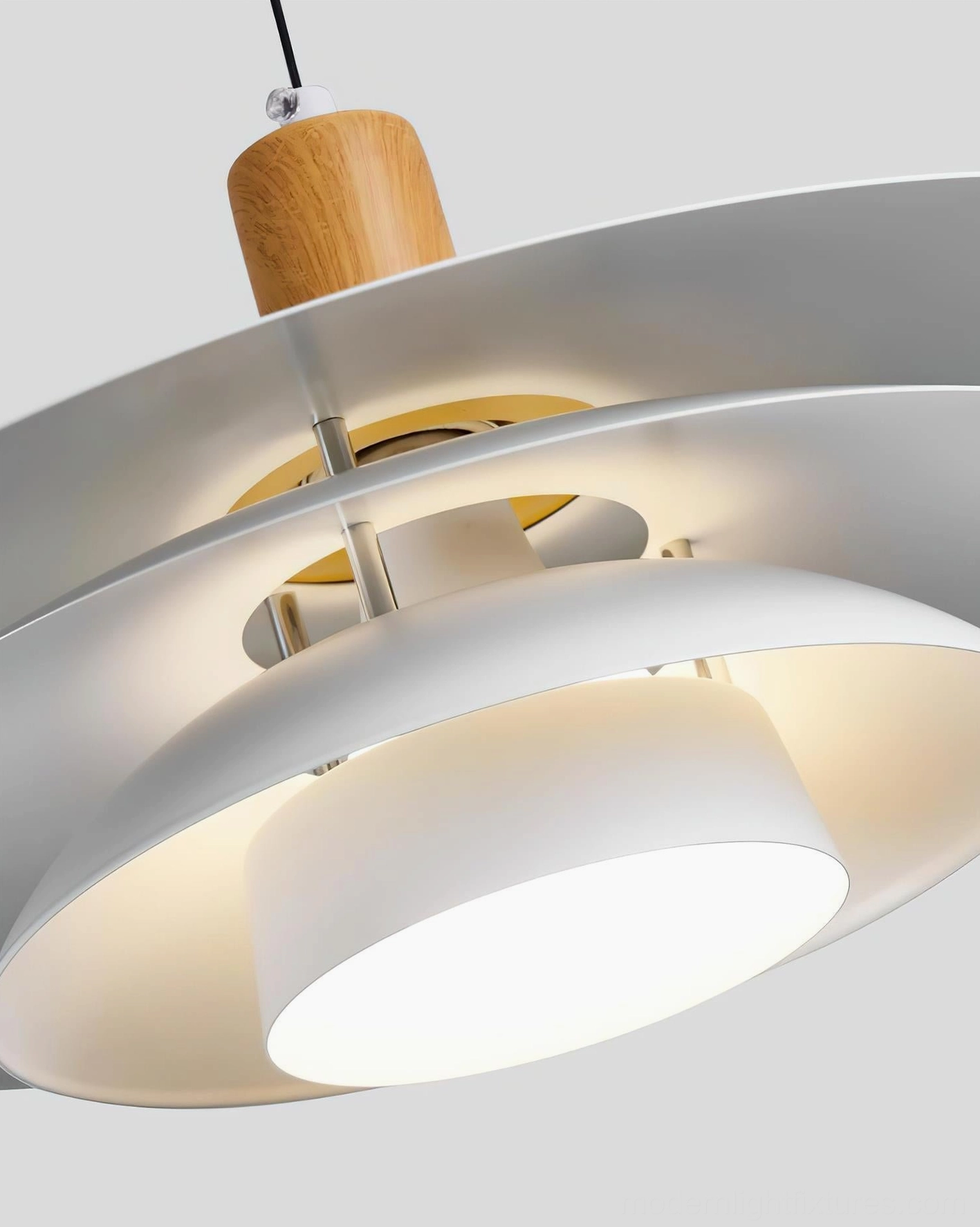 Modern layered disc pendant light showcasing Nordic design aesthetic with multi-layer metal construction and organic wood detail